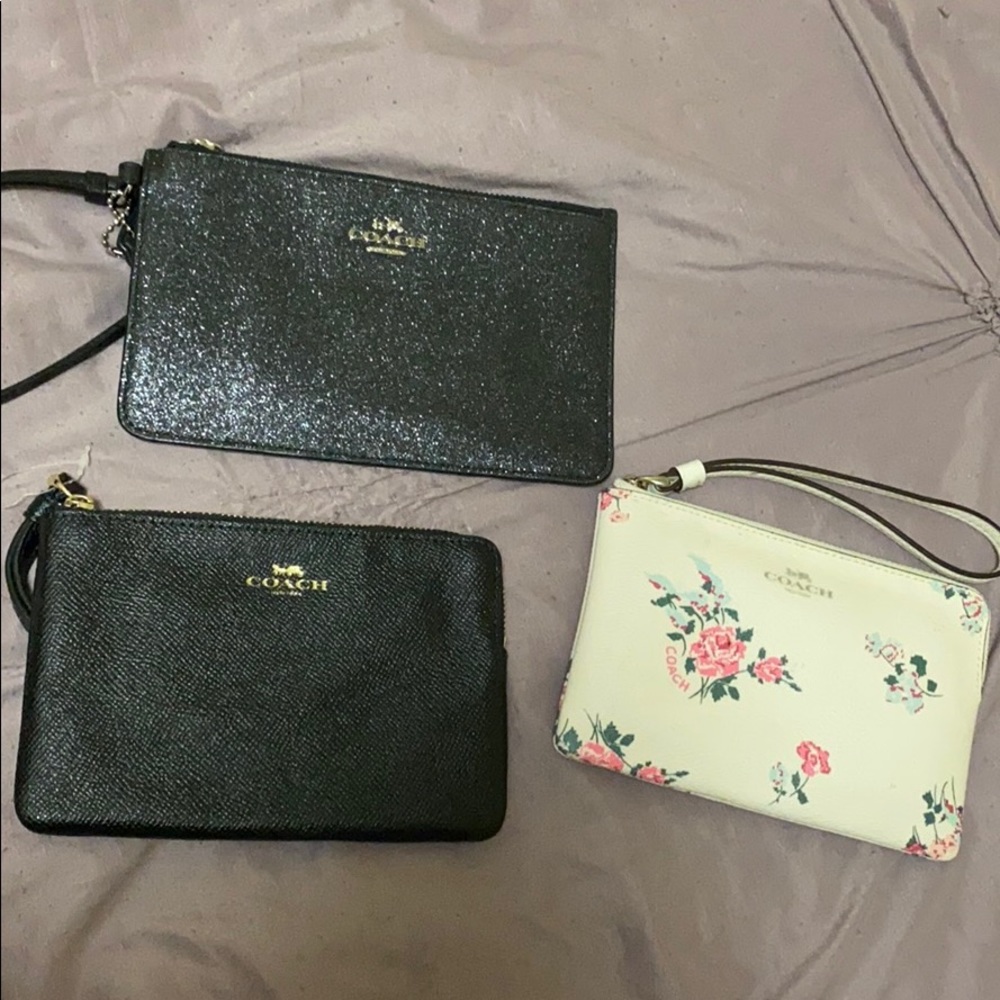 3 Coach wristlets